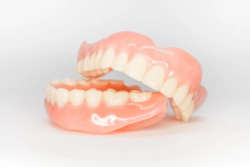 An upper and lower complete denture